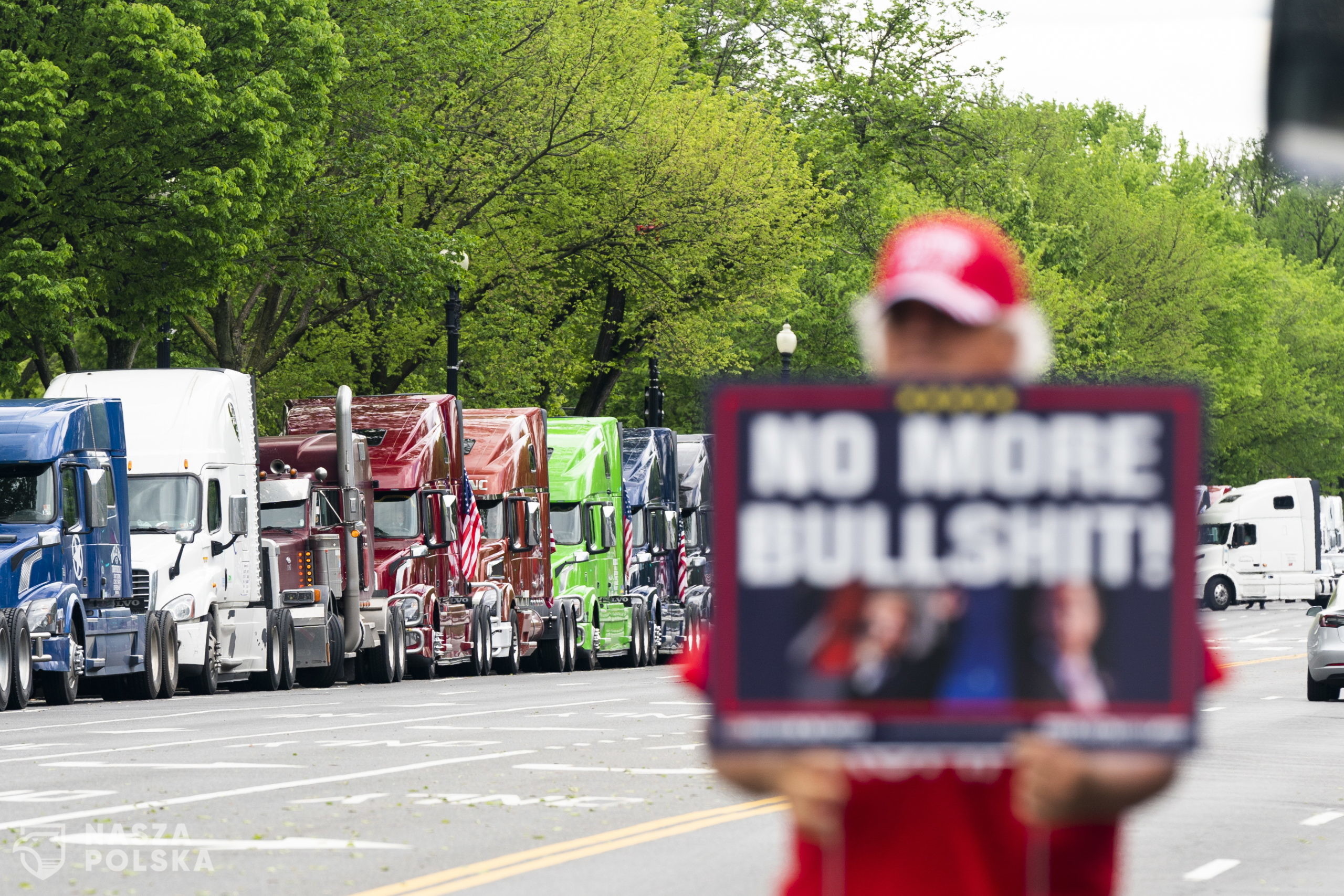 Truckers gather on Constitution Avenue for a May Day protest to highlight their complaints that brokers are taking advantage of the coronavirus COVID-19 pandemic to cut trucker pay in Washington, DC USA, 01 May 2020. They also protested lack of access to gloves and face masks during the pandemic.  (EPA/JIM LO SCALZO)